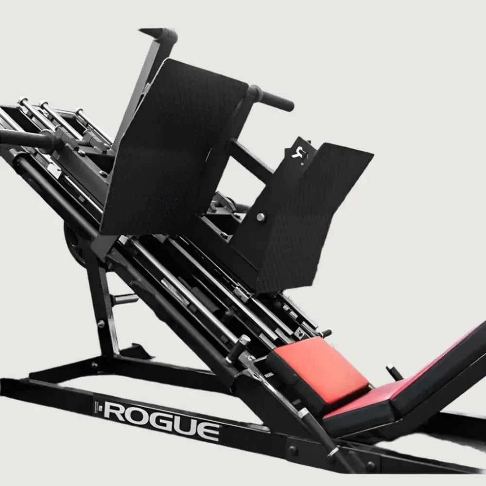 Gym machine with 'Rogue' branding on a light gray background